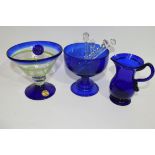 Quantity of blue glass wares, one with a spiral green design, Bristol Blue small jug, possibly