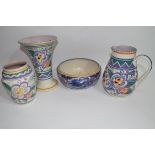 Quantity of Poole pottery wares including flared vase with geometric design, a bowl in the