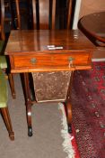 Late Georgian mahogany sewing table of rectangular form with single frieze drawer over a fabric