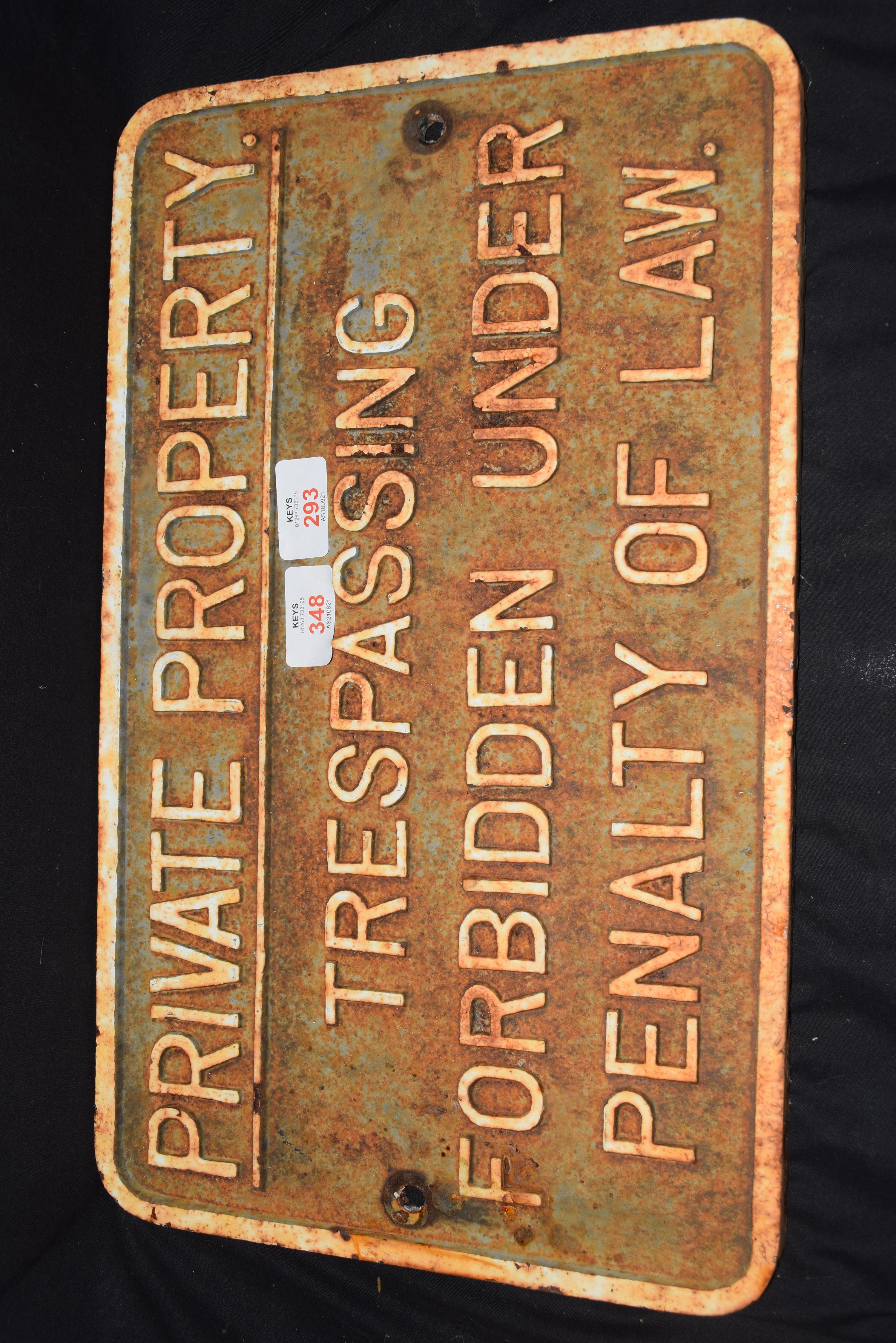 Vintage cast iron plaque marked "Private property. Trespassing forbidden under penalty of law", 45cm