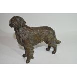 Late 19th/early 20th century bronzed metal model of a dog, 17cm high