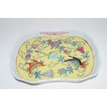 Small Chinese porcelain shaped dish, the yellow ground centre decorated with moss and butterflies,