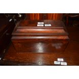 Georgian mahogany sarcophagus formed tea caddy, the hinged lid opening to an interior with two