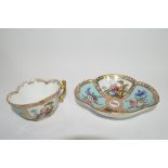 Continental porcelain Dresden cup and saucer of lobed shape decorated in Meissen style