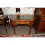 Late 19th century walnut veneered writing desk with green tooled leather inset top, single frieze