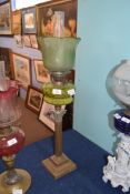 Victorian oil lamp with frosted green glass shade with floral decoration, clear glass chimney, green