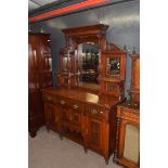 Late Victorian American walnut sideboard with triple mirrored back and base with three drawers and