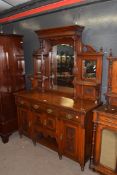 Late Victorian American walnut sideboard with triple mirrored back and base with three drawers and