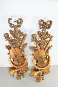 TWO MODERN GILT WOOD ORNAMENTS FORMED AS VIOLINS AND HORNS
