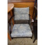 EARLY 20TH CENTURY OAK FRAMED LOW ARMCHAIR WITH FLORAL UPHOLSTERY, 65CM HIGH