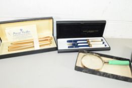 BOXED PEN SET BY PIERRE FARBER TOGETHER WITH AN OSPREY BOXED PEN SET AND A SMALL MAGNIFYING GLASS