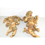 TWO MODERN GILT FINISH CHERUB FORMED WALL DECORATIONS