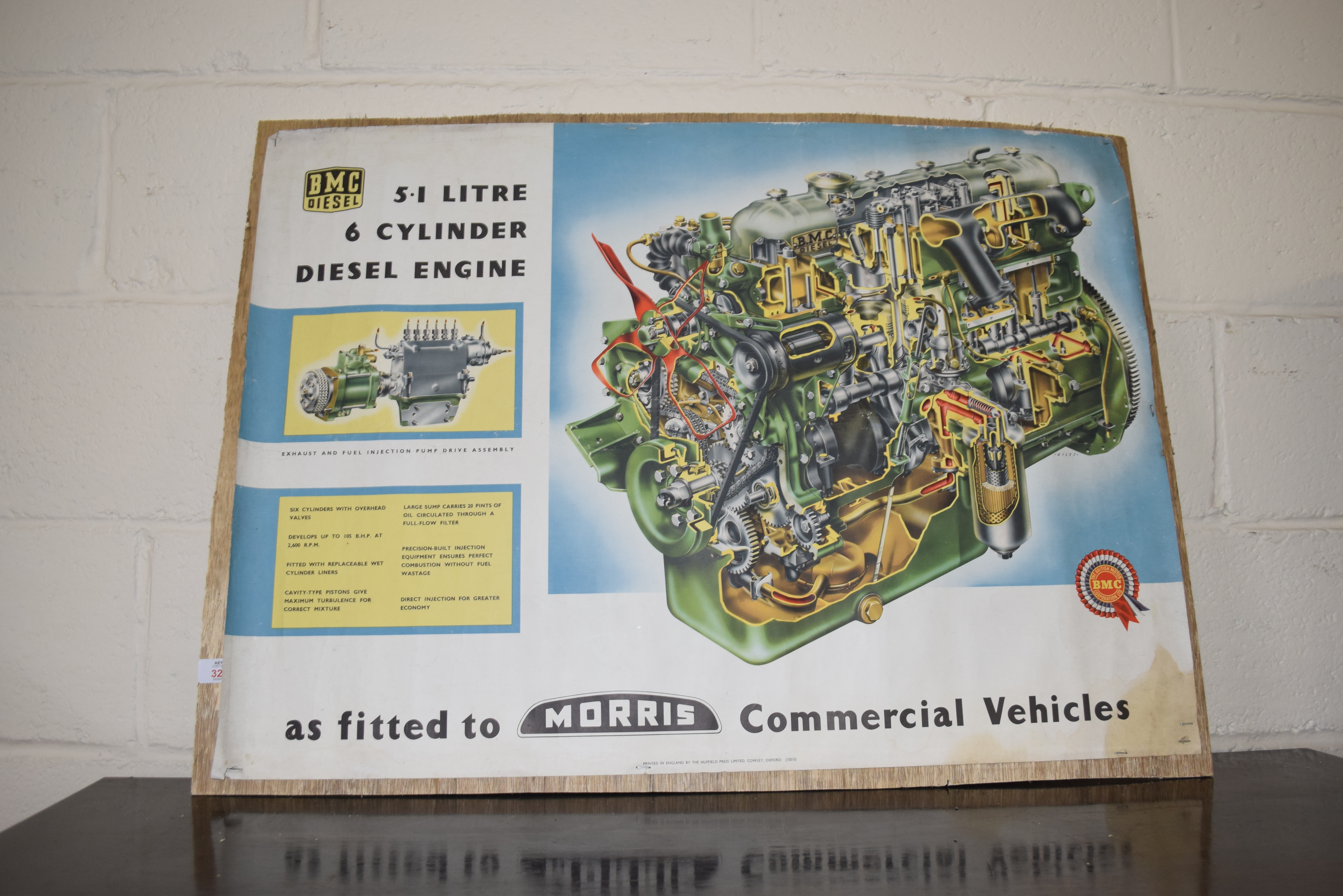 MORRIS COMMERCIAL VEHICLES DIESEL ENGINE ADVERTISING PICTURE ON WOODEN BACK, 92CM WIDE