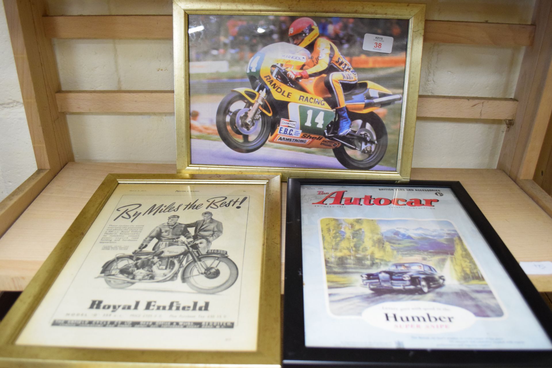 Two advertising prints taken from motorbike magazines