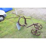 Vintage iron horse drawn plough or cultivator (a/f)