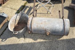 Galvanised tub along with another galvanised water storage barrel