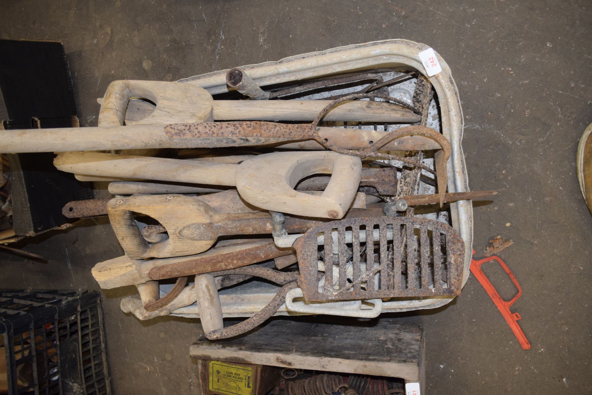 Box of mixed wooden spade handles etc