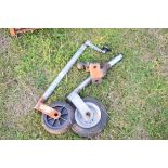 Two trailer jockey wheels and a tow bar attachment