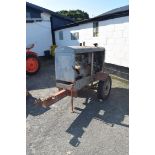 Hercules engine on a trailer hooked up to a Lincoln welder, used previously for on-site welding