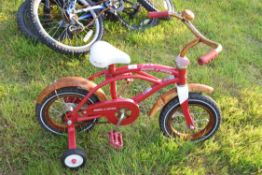 Childs Radio Flyer bike with stabilisers