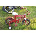 Childs Radio Flyer bike with stabilisers