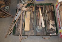 Two metal boxes with various tools