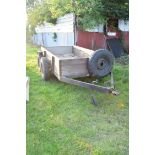 Vintage iron framed twin axle trailer with wooden sides and checkerplate interior, interior