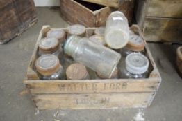 Walter Ford wooden case comprising a quantity of vintage glass jars