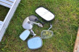 A collection of various vintage wing mirrors