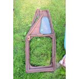 Pair of vintage iron framed tractor doors