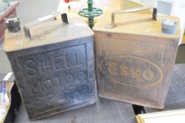 Pair of vintage oil cans, one marked Esso, the other Shell Motor Spirit