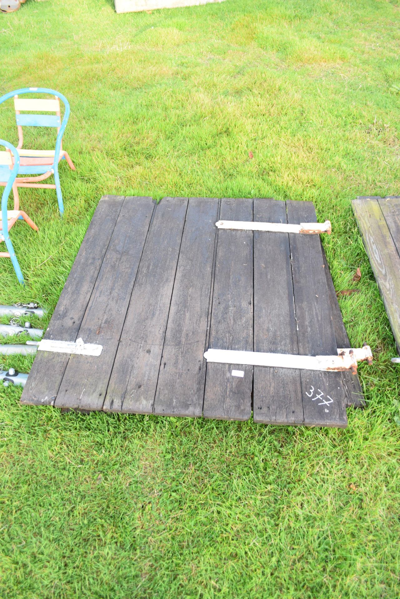 Wooden stable doors with iron hinges