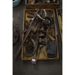 Box containing vintage tools