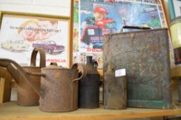 Quantity of vintage oil cans including one marked Esso