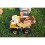 Vintage toy truck and an iron shoemaker's last