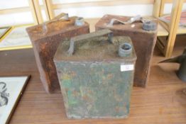 Three petrol cans, one marked Shell Motor Co