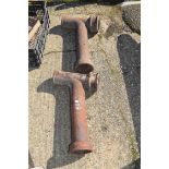 Pair of cast iron sewage pipes