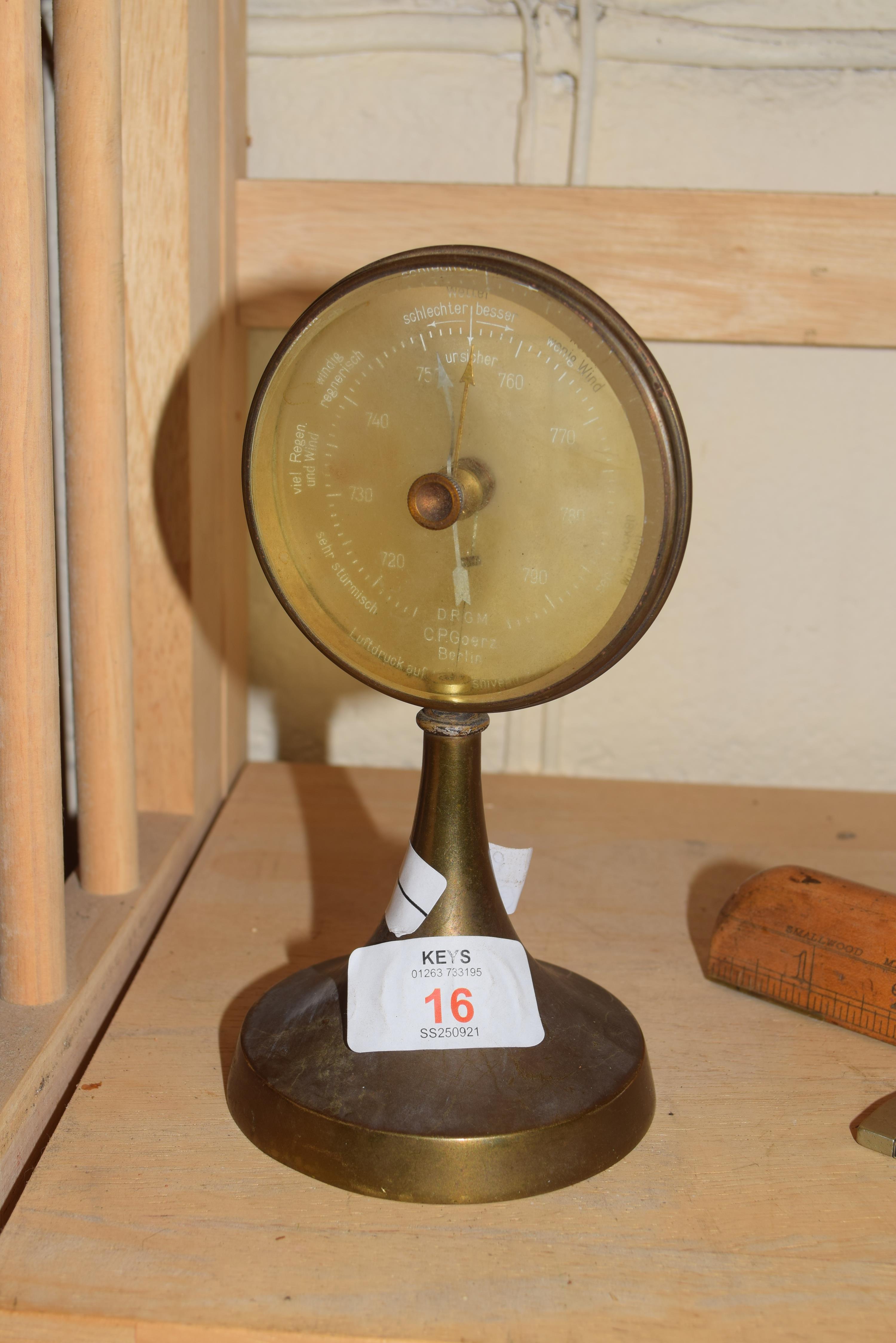C P Goerz Berlin, early 20th century brass mounted desk barometer, 17cm high
