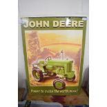 Printed John Deere advertising sign, metal, "John Deere, Power to make the earth move" featuring a