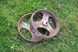 Pair of small cast iron implement wheels marked "Ritchie", 22cm diam