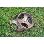 Pair of small cast iron implement wheels marked "Ritchie", 22cm diam