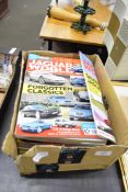 Box containing quantity of Jaguar World magazines