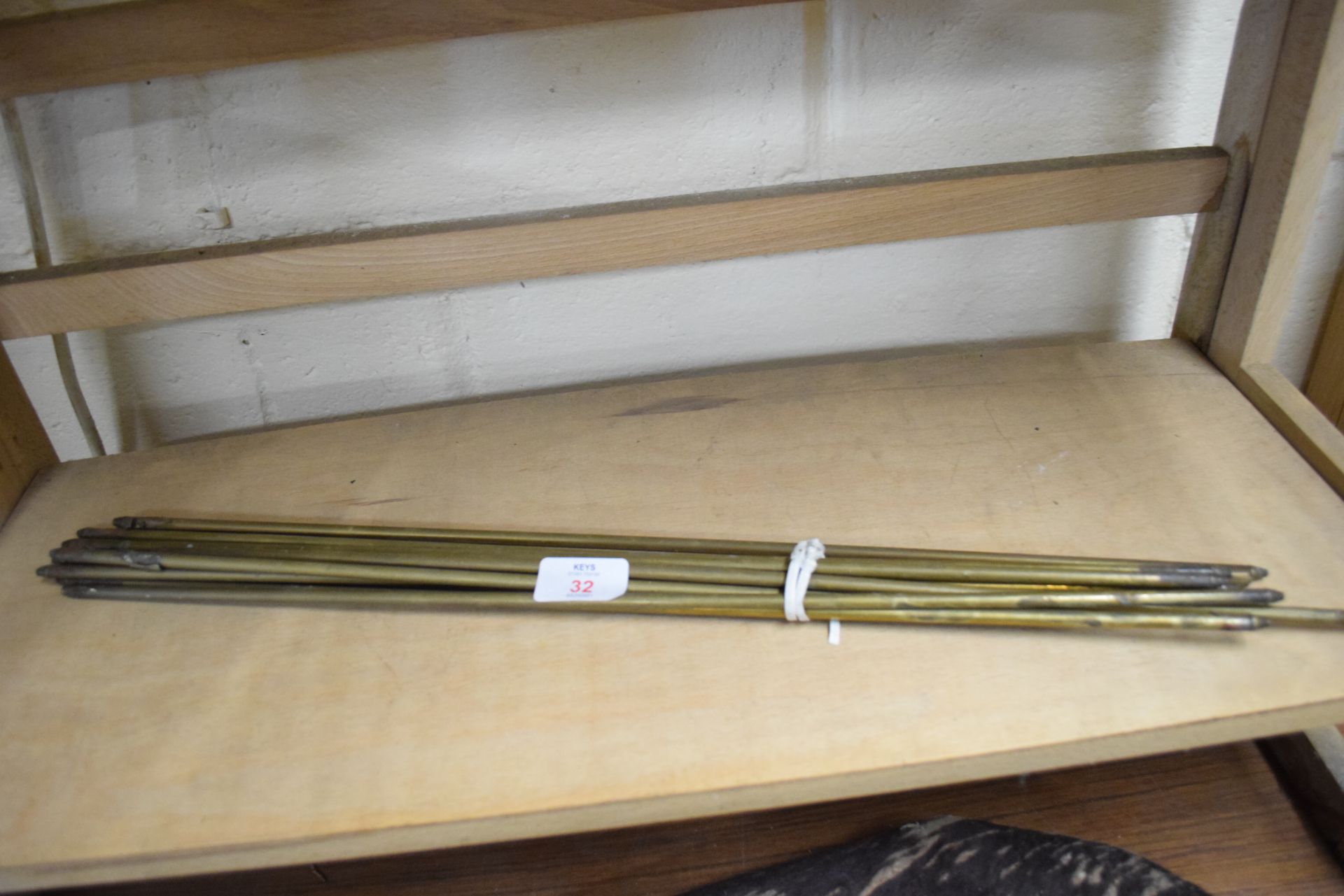 Quantity of brass rods, approx 53cm long