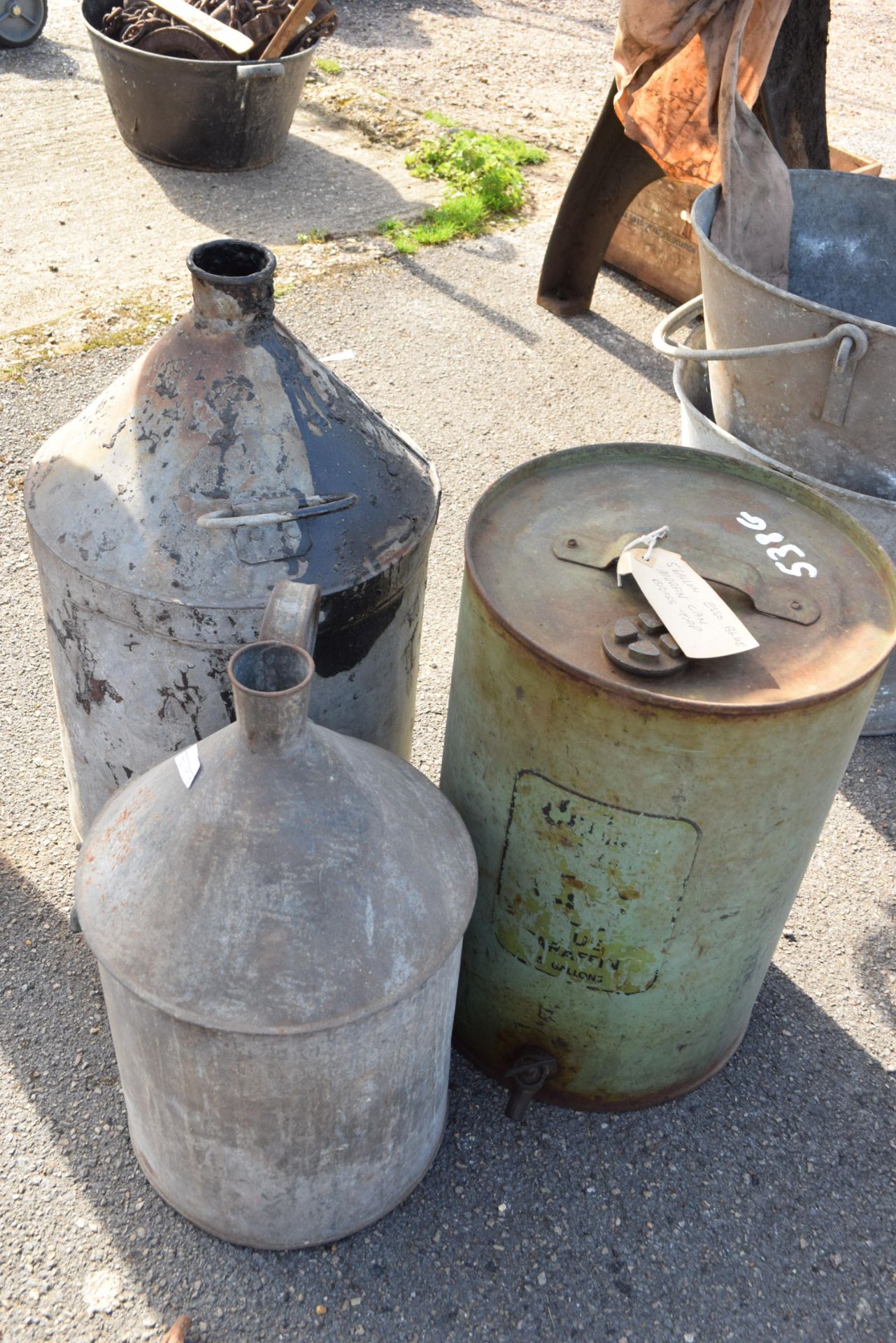 5 gallon Esso blue paraffin can with a brass tap, with two other galvanised cans