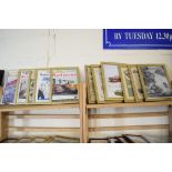 Quantity of framed advertising prints taken from a magazine on motorcycling