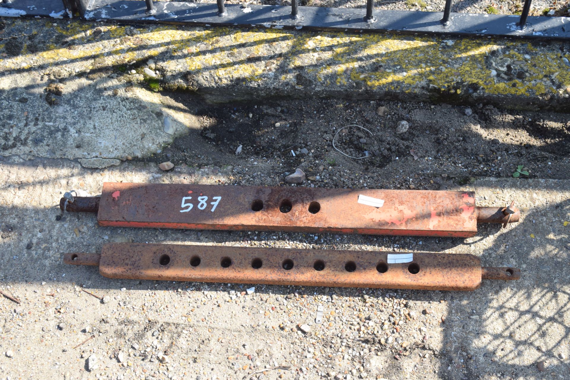 Two tractor linkage bars