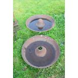 Two cast iron Mexican hat type pig feeders