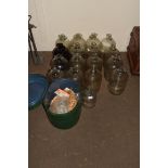 Quantity of glass carboys to include tin hat box with bottle stops