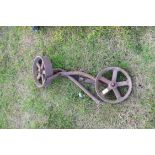 Pair of vintage iron wheels, 24cm wide