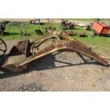 Front loading bucket for a tractor